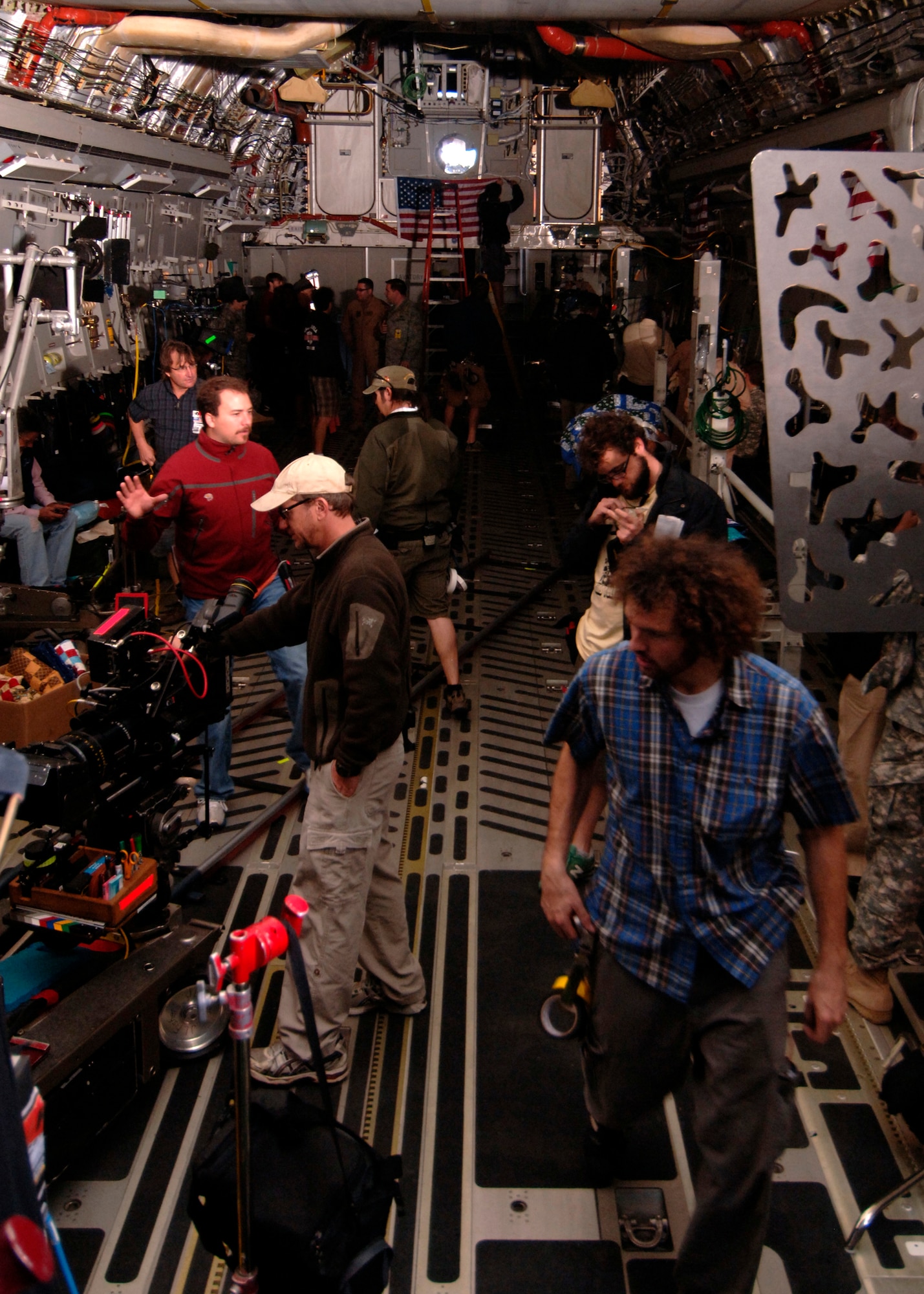 The Army Wives production crew preps the cargo bay of a Charleston C-17 for the filming of a new episode for the Lifetime Television series here March 10. Several locations on Charleston AFB were filmed, including the passenger terminal and the base shoppette. (U.S. Air Force photo/Senior Airman Timothy Taylor)

