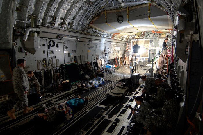 The Army Wives production crew preps the inside a Charleston C-17 for the filming of an episode for the new season of the Lifetime television series here March 10. Several locations throughout Charleston AFB were used for filming the episode. The third season of Army Wives is scheduled to begin airing June 7. (U.S. Air Force photo/Senior Airman Timothy Taylor)