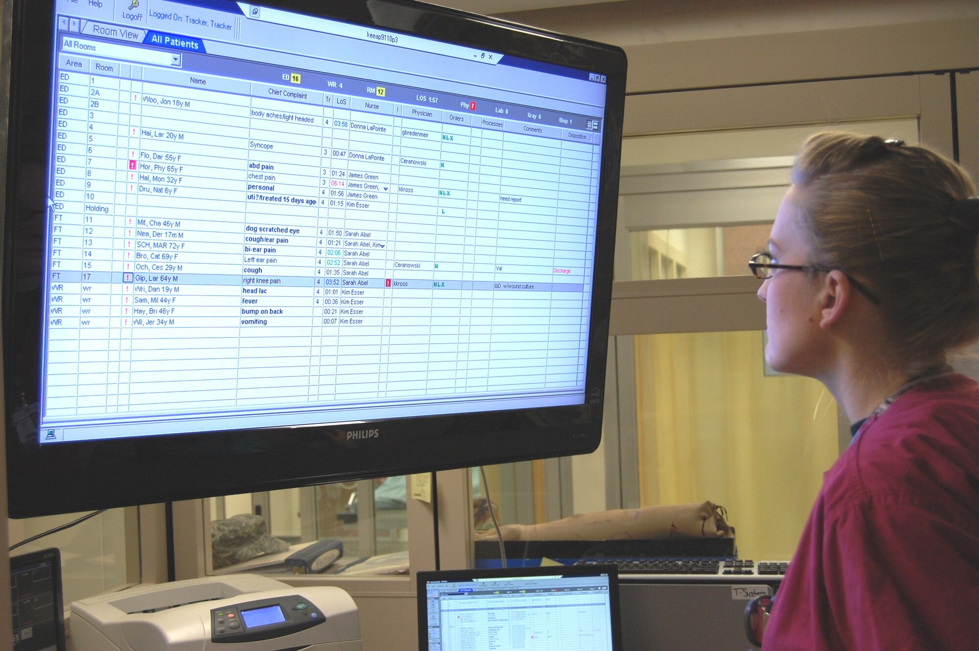 Capt. Sarah Abel, an emergency room nurse, reviews the patient status board.  (U.S. Air Force photo by Steve Pivnick)
