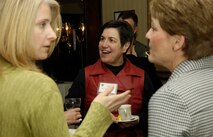 Holly Lovell, Jacki Hoffman and Janet Cooley socialize before the Key Spouse Recognition ceremony, held at the Minuteman Club March 10. During the ceremony, Mrs. Hoffman, who was visiting Hanscom with her husband, Air Force Materiel Command Commander Gen. Donald J. Hoffman, expressed appreciation to the Key Spouses for their selfless service and support of Air Force families.  (U.S. Air Force photo by Linda LaBonte Britt)