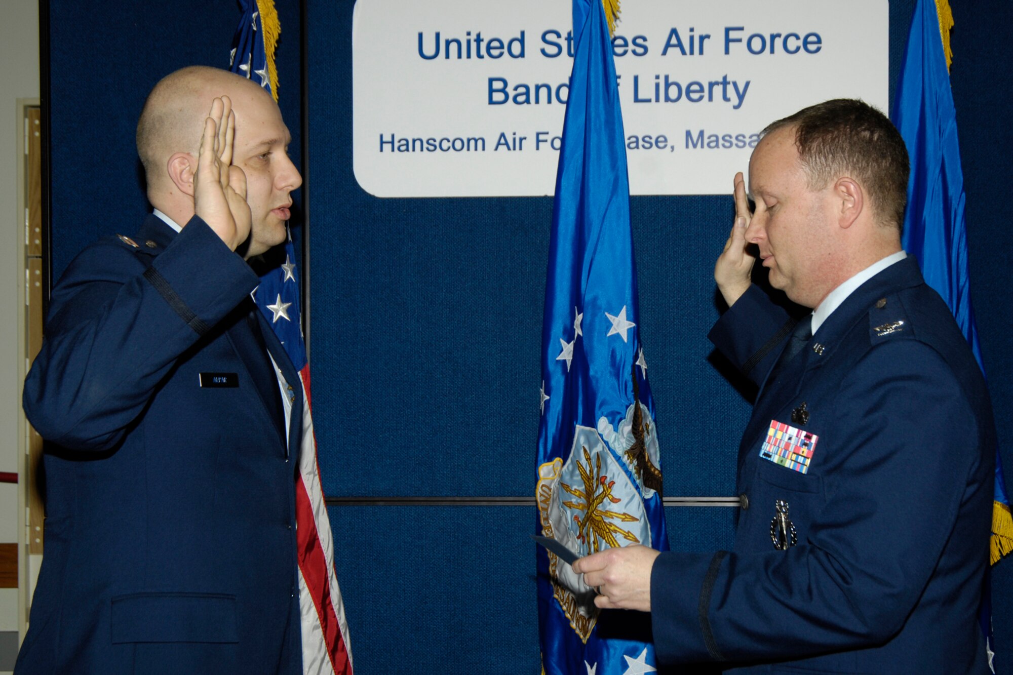 The Promotion Ceremony for Captain David A. Alpar (Commander/Conductor of the USAF Band of Liberty) was held on February 23, 2009 and was officiated by 
Colonel Russell J. Blaine (Chief of Staff, Electronic Systems Center, Hanscom AFB).