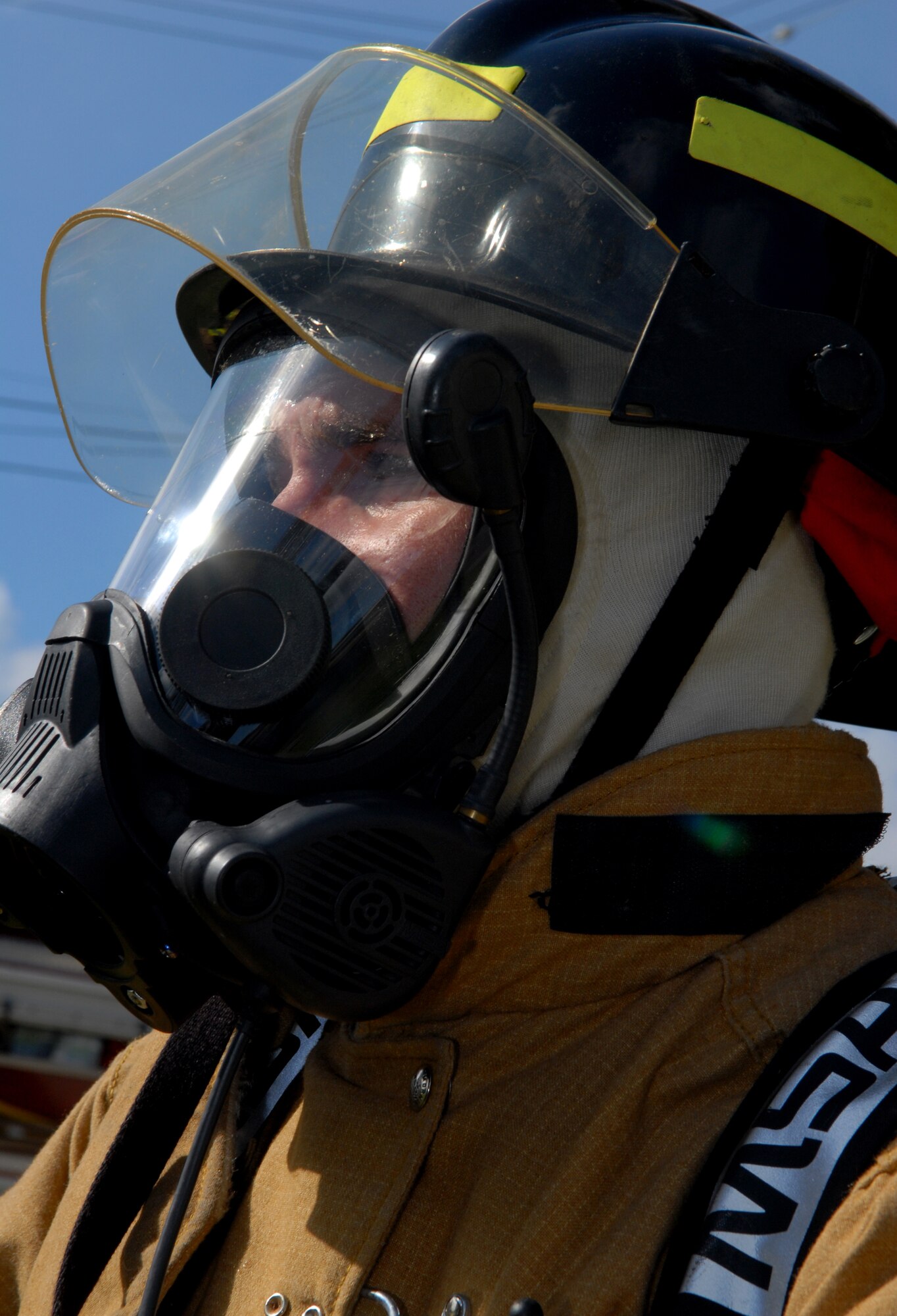 VANDENBERG AIR FORCE BASE, Calif.-- Staff Sgt. Jeb Fach prepares to approach a door during a search and rescue exercise March 5 in East Housing here.  Vandenberg's firefighters went through the training to prepare for possible future rescue situations. (U.S. Air Force photo/Airman 1st Class Antoinette Lyons)