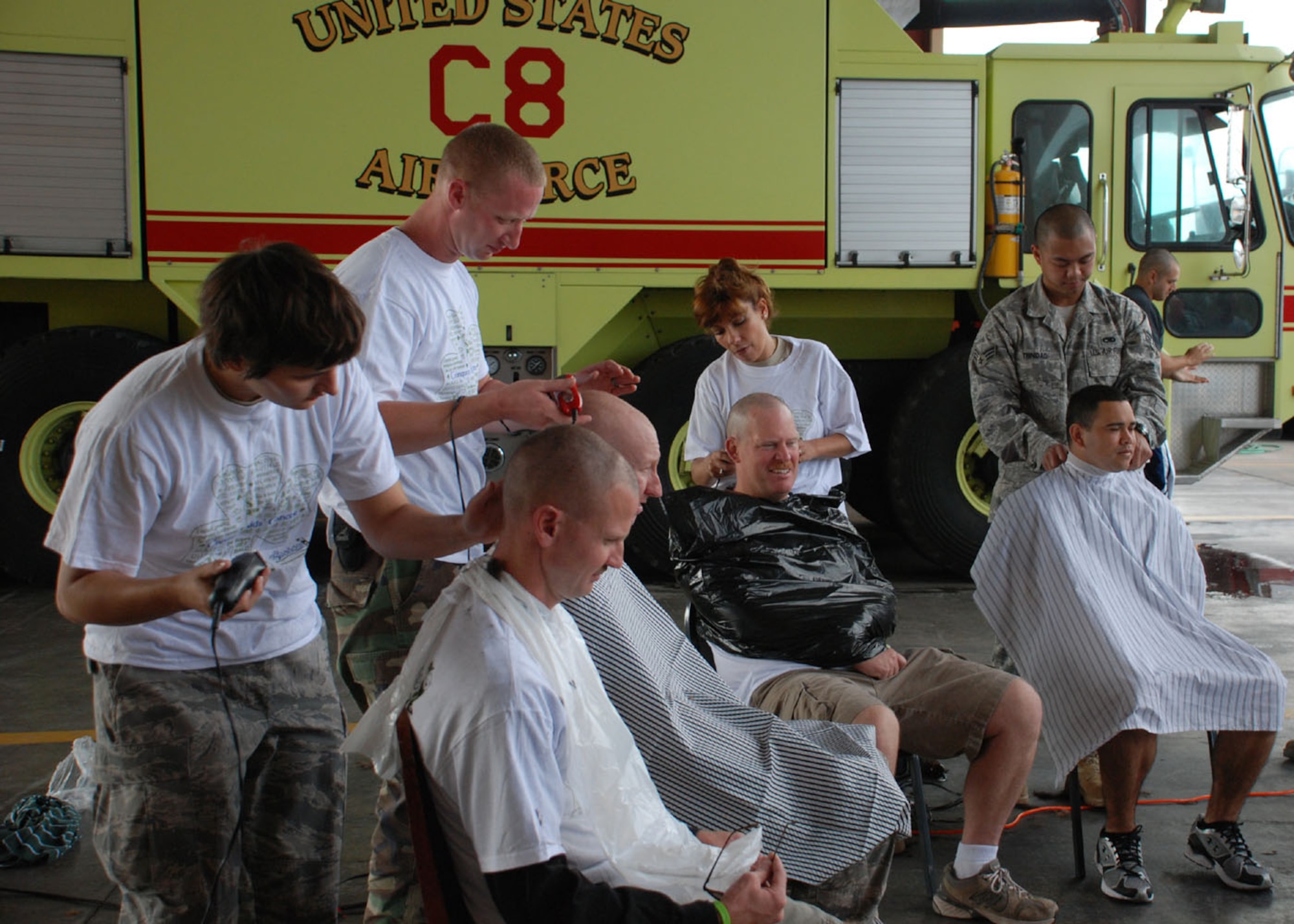 SOTO CANO AIR BASE, Honduras -- The Soto Cano Fire Department raised more than $2,500 for children's cancer research through the St. Baldrick's Foundation by holding a head-shaving event here March 6.  Spnsored by family and friends, volunteers went bald in solidarity with kids who typically lose their hair during cancer treatment.  (U.S. Air Force photo/Tech. Sgt. Rebecca Danét)
 
 