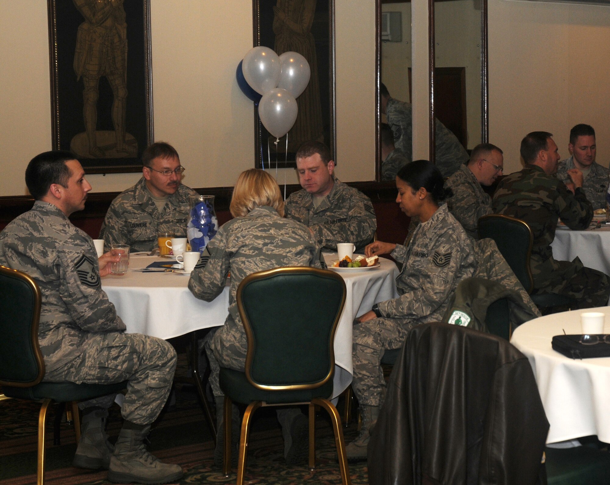 Attendees of the Air Force Assistance Fund campaign kick-off enjoy a breakfast buffet March 10, 2009 at RAF Lakenheath. England. The AFAF is an annual campaign to raise money for Air Force charities such as the Air Force Aid Society, Inc., the General and Mrs. Curtis E. LeMay Foundation, and the Air Force Enlisted Village, Inc. This year’s campaign will run from March 10 to April 21. (U.S. Air Force photo by Senior Airman Kristopher Levasseur)