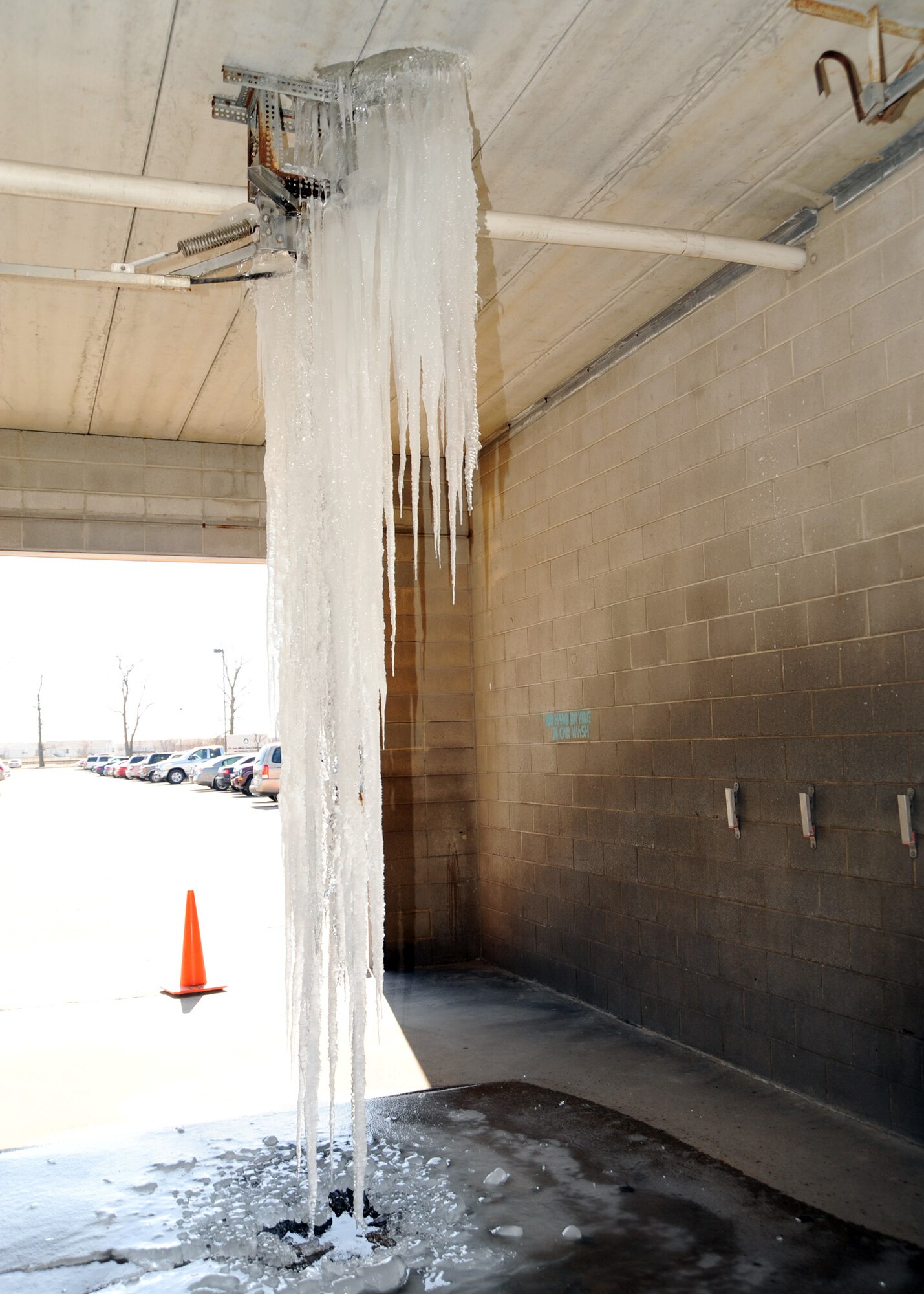 SCOTT AIR FORCE BASE, Ill. --One of the bays at the Car Wash was temporarily out of service due to a large icicle. The icicle extended from the ceiling to the floor.(U.S. Air Force photo/Airman 1st Class Wesley Farnsworth) 