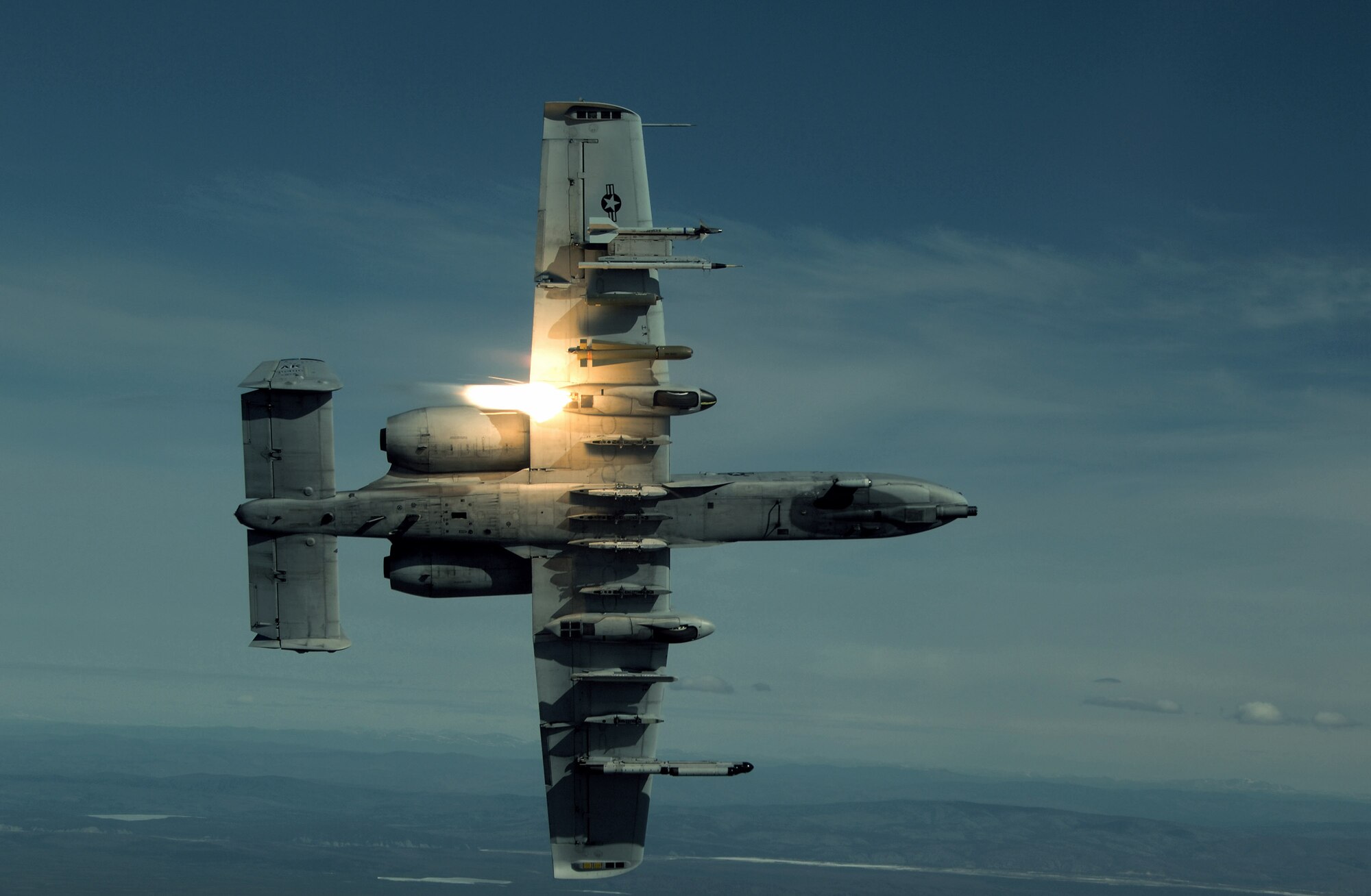 An A-10 Thunderbolt II, like this one, provides top cover and close-air support to coalition forces in Afghanistan and Iraq. The A-10s perform shows of force to deter enemy activities and protect ground forces.  (U.S. Air Force photo/Master Sgt. Robert Wieland) 