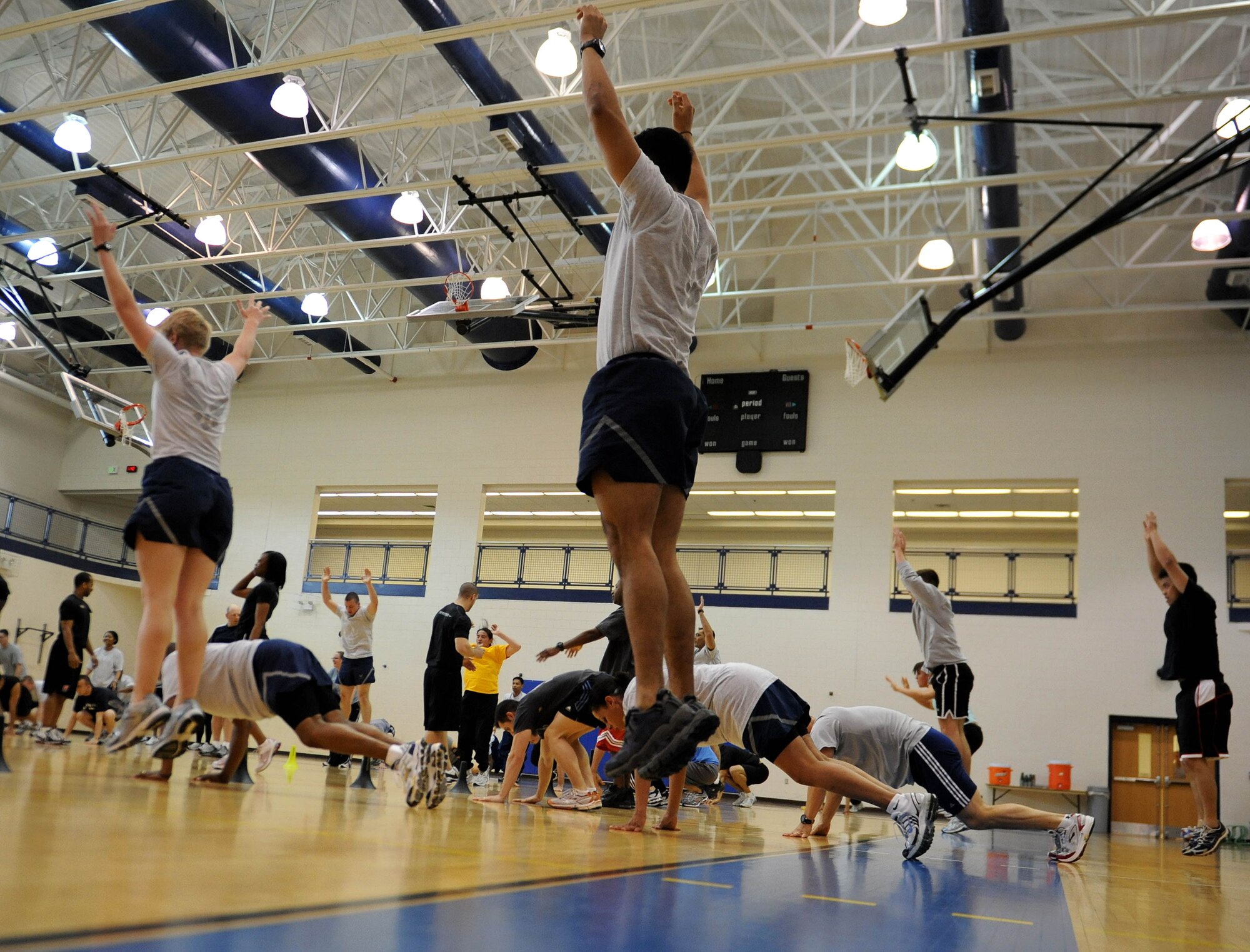 LANGLEY AIR FORCE BASE, Va. -- 2nd Lt. Jethro Sadorra, 1st Civil Engineer Squadron, participates in a Velocity Sports Performance warm up exercise at the Shellbank Fitness Center March 10. Performance coaches held the workshop to teach Airmen new innovative training methods for building their physical fitness. (U.S. Air Force photo/Airman Rebecca Montez)
