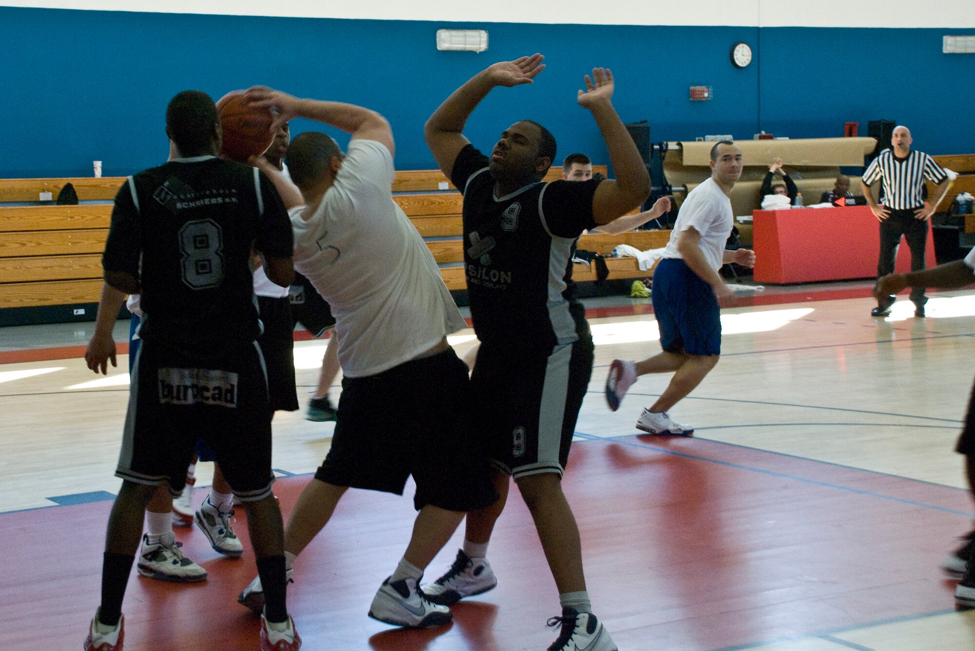 LIVORNO, Italy – Spangdahlem’s David Billups attempts to pass the ball during the semifinals against Kleine Brogel March 7, 2009. Spangdahlem ended up placing second and Kleine Brogel third in the 2009 U.S. Ai Force Europe Central Region Basketball Champions. (U.S. Air Force photo by Joyce Costello)