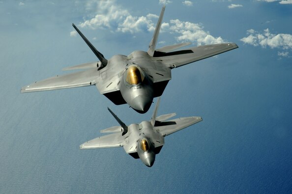 Two F-22 Raptors fly over the Pacific Ocean during a theater security mission March 9. The Raptors are deployed from Elmendorf Air Force Base, Alaska to the 90th Expeditionary Fighter Squadron Andersen Air Force Base, Guam. Fourteen of the $140 million dollar aircraft, and more than 250 Airmen have been here since January for a three month deployment as the Pacific's Theater Security Package. The stealth-fighters, along with associated maintenance and support personnel will participate in various exercises that provide routine training in an environment different from their home station. 

(U.S. Air Force photo/ Master Sgt. Kevin J. Gruenwald) released


















  












 











































  












 

























