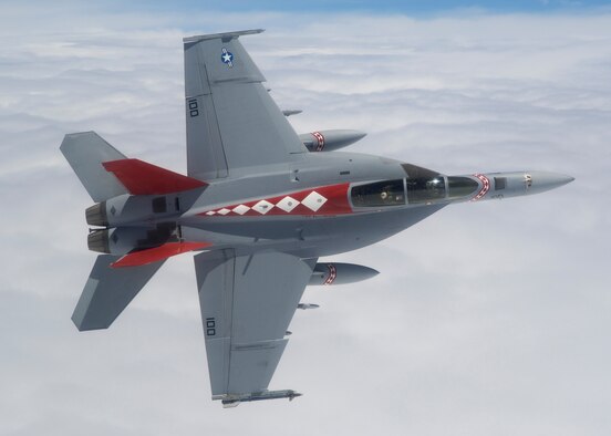 An F/A-18 Super Hornet from the Navy Strike Fighter Squadron 102 "Diamondbacks" flies over the Pacific.  (U.S. Navy courtesy photo)
