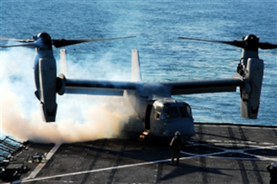 U.S. Marines aboard an MV-22 Osprey prepare to take off from the amphibious dock-landing ship USS Fort McHenry in the Atlantic Ocean, March 3, 2009. Elements of the Bataan Amphibious Readiness Group and the 22nd Marine Expeditionary Unit are off the Atlantic Coast for a certification exercise, the third and final certification for the amphibious readiness group and the  22nd Marine Expeditionary Unit before their deployment later this spring.