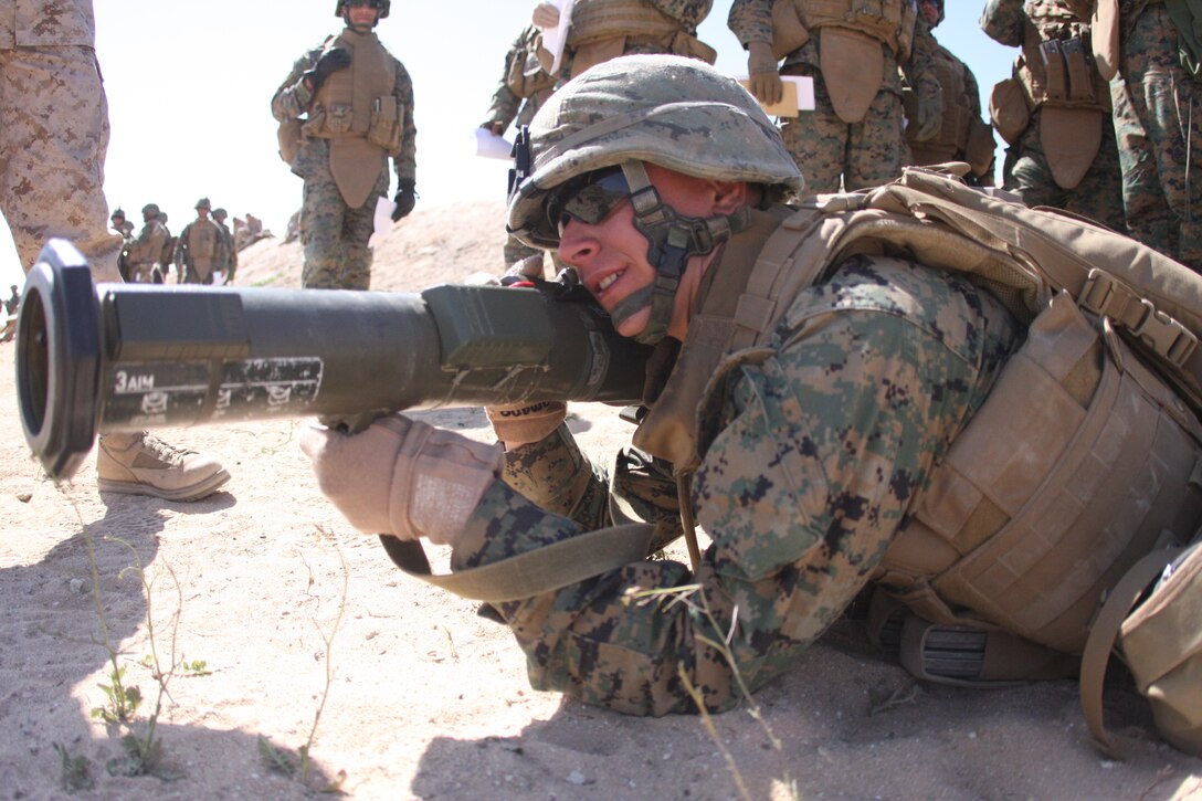 Cpl. Nick Romano, a fire team leader with Company E, 2nd Battalion, 7th Marine Regiment, practices the prone position for firing the AT4 anti-armor weapon during a Tactical Small Unit Leaders Course on Range 105A aboard the Combat Center March 10 through March 19.  The AT4 is so powerful it can take out a light skinned vehicle or immobilize a tank.