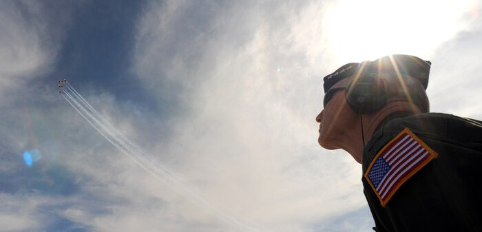 Gen. John D. W. Corley, Air Combat Command commander, watches as the 2009 U.S. Air Force Thunderbirds fly in Delta formation during the Thunderbird Acceptance Show, March 12. The acceptance show kicks-off the Thunderbird's travel season. The Thunderbirds are scheduled to perform in more than 70 shows in the United States, Puerto Rico and the Far East. (USAF Photo by Staff Sgt. Kristi Machado) (RELEASED)
