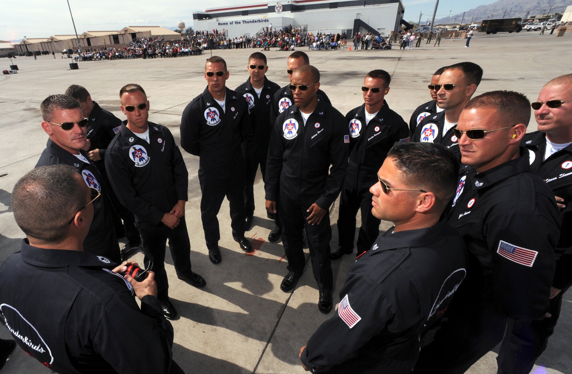Maintainers from the U.S. Air Force Thunderbirds debrief after their ground show performance during the 2009 Thunderbird Acceptance Show, March 12.  The Thunderbirds are scheduled to perform in more than 70 shows in the United States, Puerto Rico and the Far East.  (USAF Photo by Staff Sgt. Kristi Machado) (RELEASED)