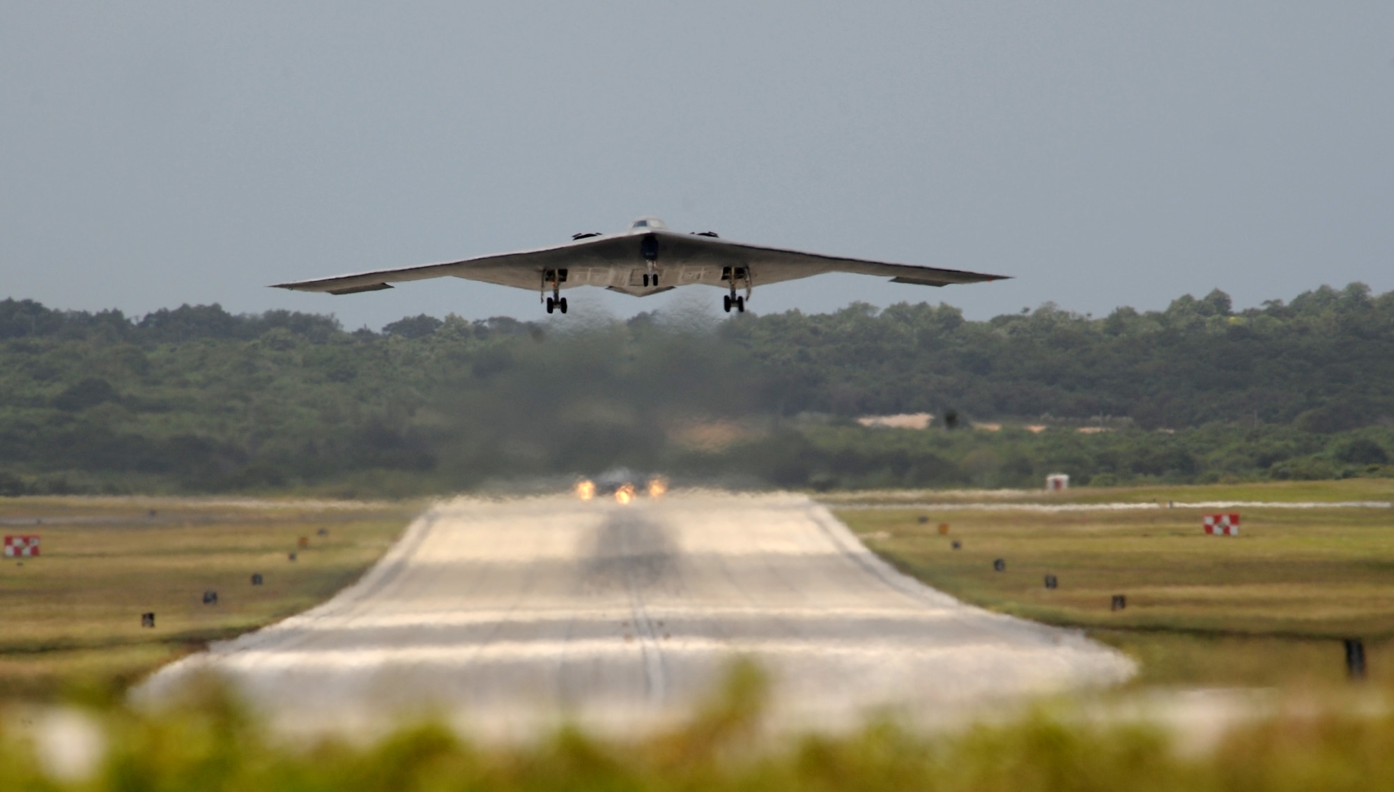 A B-2 Spirit from the 509th Bomb Wing, 13th Bomb Squadron Whiteman
Air Force Base, Mo., gets airborne while another B-2 waits for clearance at Andersen Air Force Base, Guam March 4. More than 270 Airmen and four B-2 Spirits are deployed to Andersen supporting the Pacific Regions Continuous Bomber Presence. 

(U.S. Air Force photo/ Master Sgt. Kevin J. Gruenwald) released





















  












 











































  












 

























