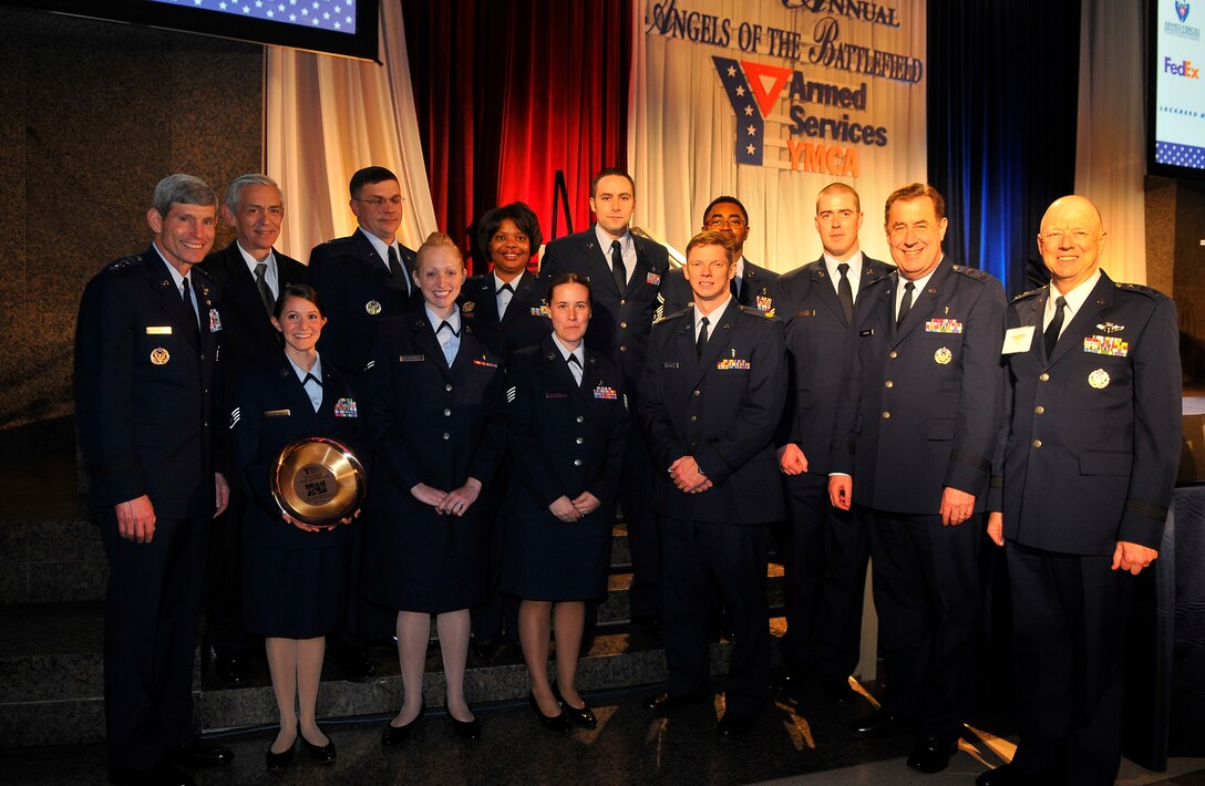U.S. Air Force medical professionals from the 79th Medical Wing, stand for a photo with  U.S. Air Force Chief of Staff, Gen. Norton A. Schwartz, Mr. Craig W. Duehring, Assistant Secretary of the Air Force for Manpower and Reserve Affairs, Maj. Gen. (Dr.) Gar S. Graham, 79th Medical Wing Commander and Lt. Gen. (Dr.) James G. Roudebush, U.S. Air Force Surgeon General during a gala dinner in honor of military medics and corpsman at the Ronald Reagan Building in Washington, D.C., March 11, 2009.   (U.S. Air Force photo by Tech. Sgt. Suzanne M. Day)

