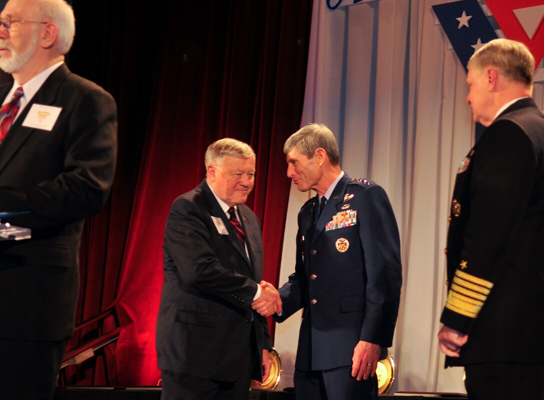 U.S. Air Force Chief of Staff, Gen. Norton A. Schwartz, greets Gen. (Ret) Eugene Habiger, Chairman of the Board, Armed Services YMCA, during a gala dinner in honor of military medics and corpsman at the Ronald Reagan Building in Washington, D.C., March 11, 2009.    (U.S. Air Force photo by Tech. Sgt. Suzanne M. Day)
