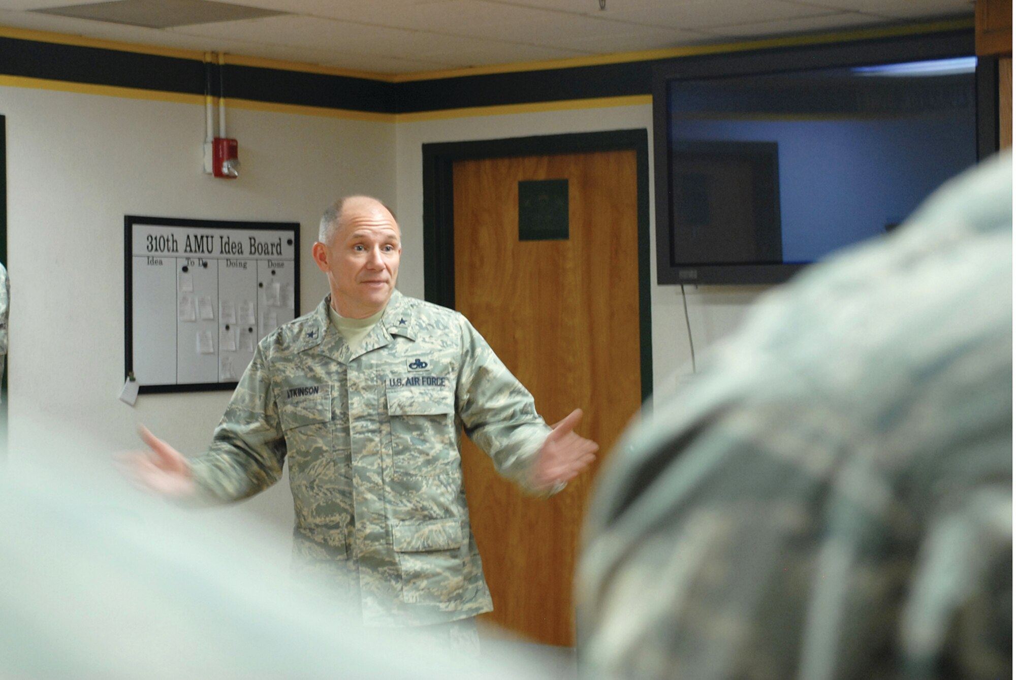 Brig. Gen. Mark Atkinson, 402nd Maintenance Wing commander, Warner Robins Air Logistics Center, Robins Air Force Base, Ga., speaks with the Maintenance Professional of the Year nominees before the start of the banquet. (U.S. Air Force photo/ Airman 1st Class Tracie Forte)