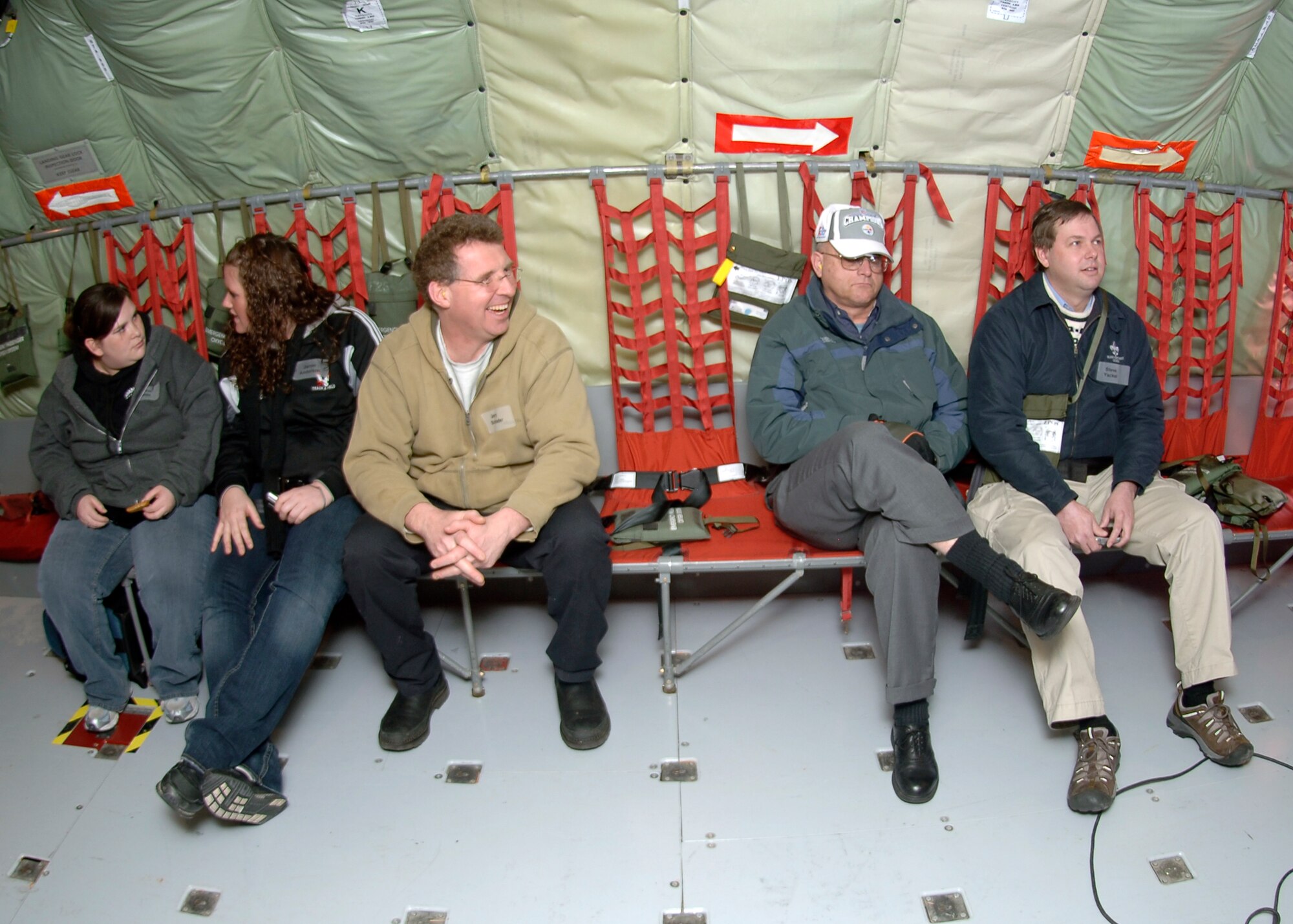 Honorary Commanders Stephanie Martinez, Northern Quest Casino; Jamie Anderson, Northern Quest Casino; Jerry Shrader, Northern Quest Casino; Joe Shogan, Spokane City Council President,  and Steven Yackel, Chief Nordel’s honorary commander, wait their turn to lie in the boom to view an F-15 refueling  on March 5. The Honorary Commanders program pairs Spokane Civic Leaders with personnel at Fairchild to form a bond and familiarize the community with Fairchild operations. (U.S. Air Force photo / Airman 1st Class Melissa L. Barnett)