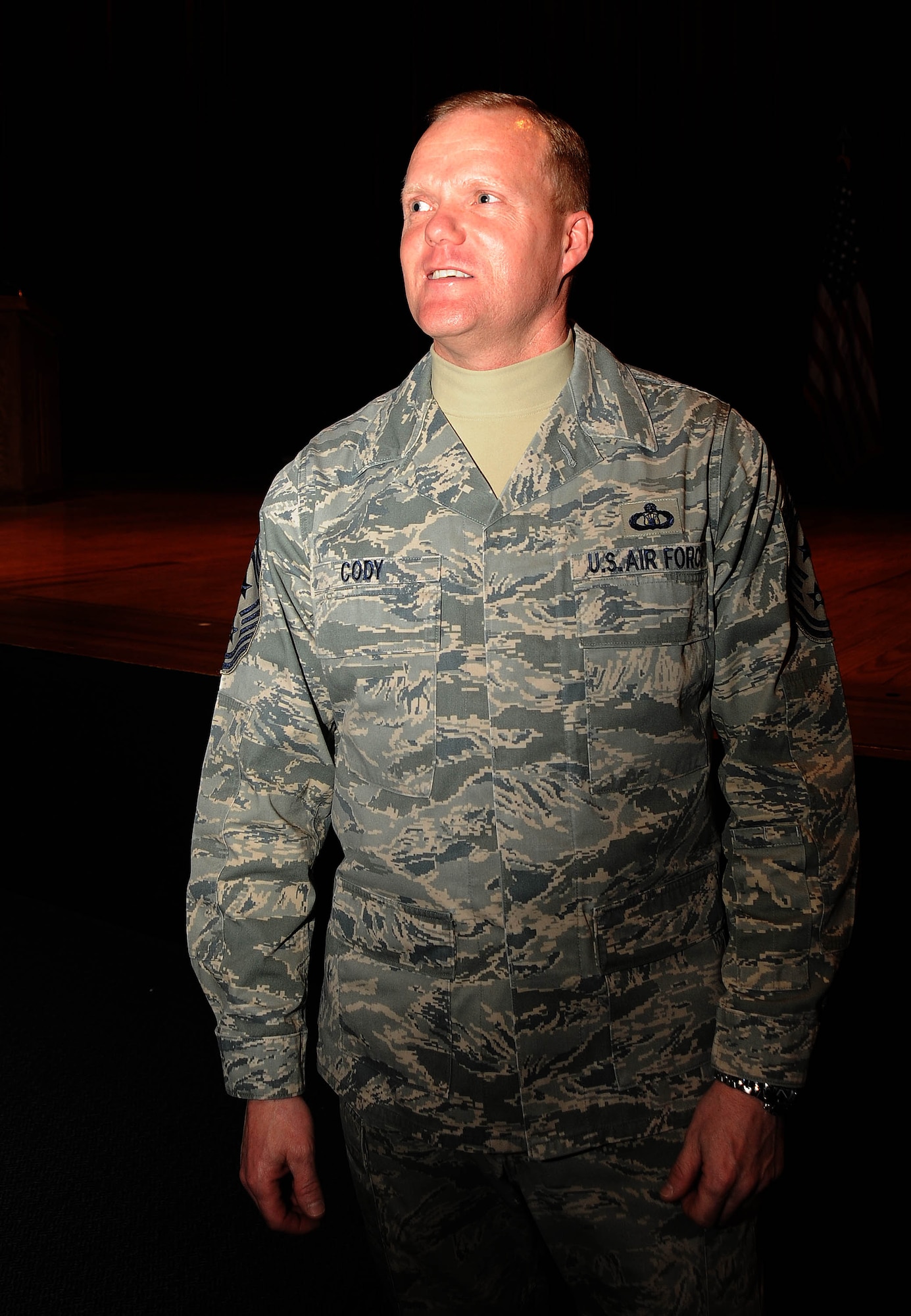 Eighteenth Air Force Command Chief Master Sgt. James Cody of Scott Air Force Base, Ill., speaks to a capacity-packed theater of Fairchild Airmen March 6. Focusing on the most recent topics coming from the Air Force’s top leadership, Chief Cody relayed to Airmen current and future changes to include Total Force Integration, the Operational Readiness Inspection, enlisted performance report inflation and how it can change, taking advantage of the education system and its benefits, the new presidential administration, privatized housing, and the current physical training program. Highlighting one of Fairchild’s top priorities, TFI’s Classic Association between the 92nd Air Refueling Wing and 141st Air Refueling Wing, Washington Air National Guard, Chief Cody stated, “I know this has been a lot of work and you’ve got a lot of visibility from above… but looking what’s been accomplished so far tells me there’s no doubt we’ll get this done.” (U.S. Air Force photo/Staff Sgt. JT May III)
