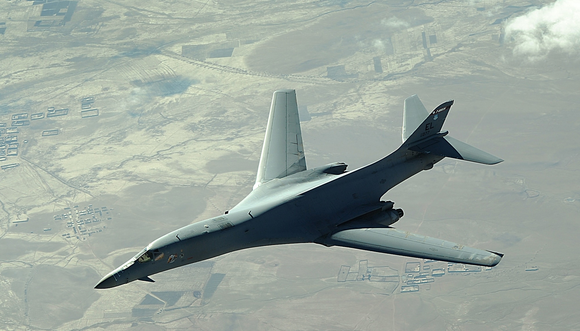 A B-1B Lancer flies a combat patrol mission over Afghanistan recently.  B-1Bs fly close-air-support missions for both Operation Enduring Freedom and Operation Iraqi Freedom. The B-1B is assigned to the 34th Expeditionary Squadron. (U.S. Air Force photo/Staff Sgt. Aaron Allmon)  
