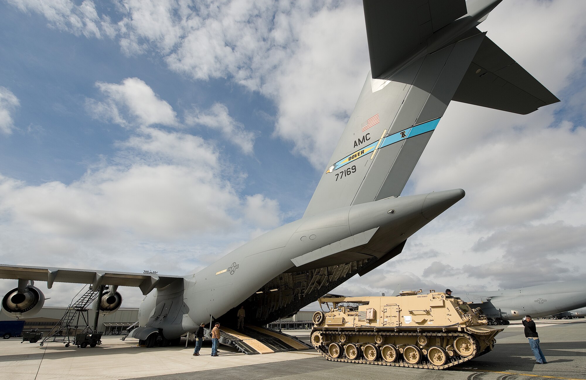 A M88A2 HERCULES (Heavy Equipment Recovery Combat Utility Lift and Evacuation System) is loaded on the cargo deck of a C-17 Globemaster III. The HERCULES is used to safely tow and recover inoperative tanks. The M88A2 provides protection against small arms fire, artillery fragments and anti-personnel mines. It is configured with an A-frame boom, three winches and spade. In comparison to the M88A1, its predecessor, the M88A2 boom can lift 40 percent heavier loads with its 35-ton lift capacity, and the main winch has a constant pull capacity of 70 tons.  (U.S. Air Force photo/Jason Minto)