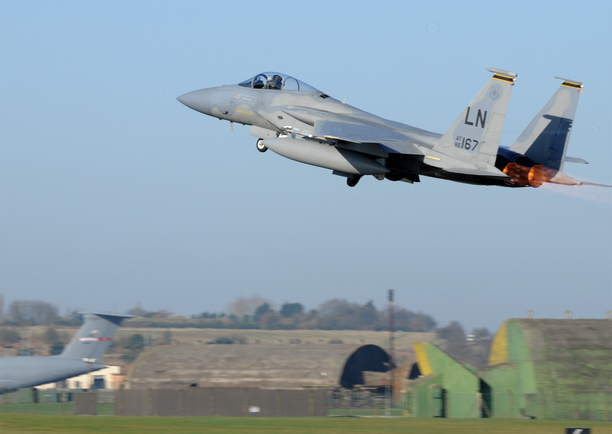 A 493rd Fighter Squadron F-15C Eagle stows it’s landing gear after taking off to fly to Gando Air Base, Spain March 6, 2009. F-15s from RAF Lakenheath are flying to Spain to participate in a two-week dissimilar air combat training exercise. (U.S. Air Force photo by Staff Sgt. Nathan Gallahan.)