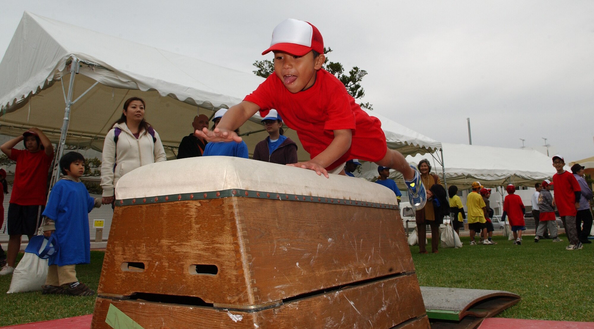 An Okinawan child takes part in an obstacle coarse during the U.S.-Japan
Sports and Cultural Exchange event at the Rotary Plaza in Okinawa, Japan,
March 14.  (U.S. Air Force photo/Tech. Sgt. Rey Ramon) 