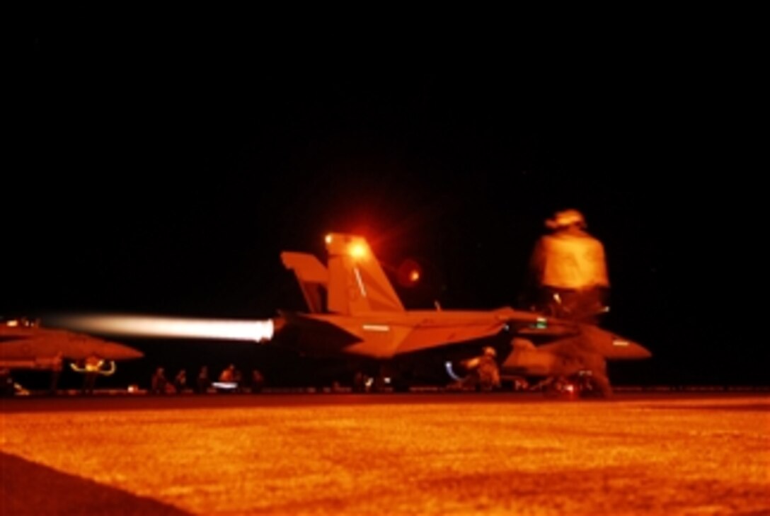 A U.S. Navy F/A-18F Super Hornet aircraft from Strike Fighter Squadron 154 goes to full power prior to launching from the flight deck of the aircraft carrier USS John C. Stennis (CVN 74) in the Pacific Ocean on March 6, 2009.  The Stennis and Carrier Air Wing 9 are on a six-month deployment to the western Pacific.  