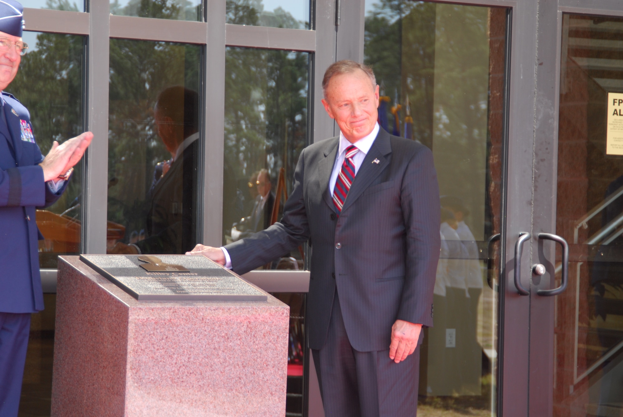 Maj. Gen. Philip Killey, former 1st Air Force commander, smiles as he sees
the bronze pedestal unveiled in his honor, officially designating the new
1st Air Force headquarters complex as the "Killey Center for Homeland
Operations.   (U.S. Air Force photo by Lisa Norman)
