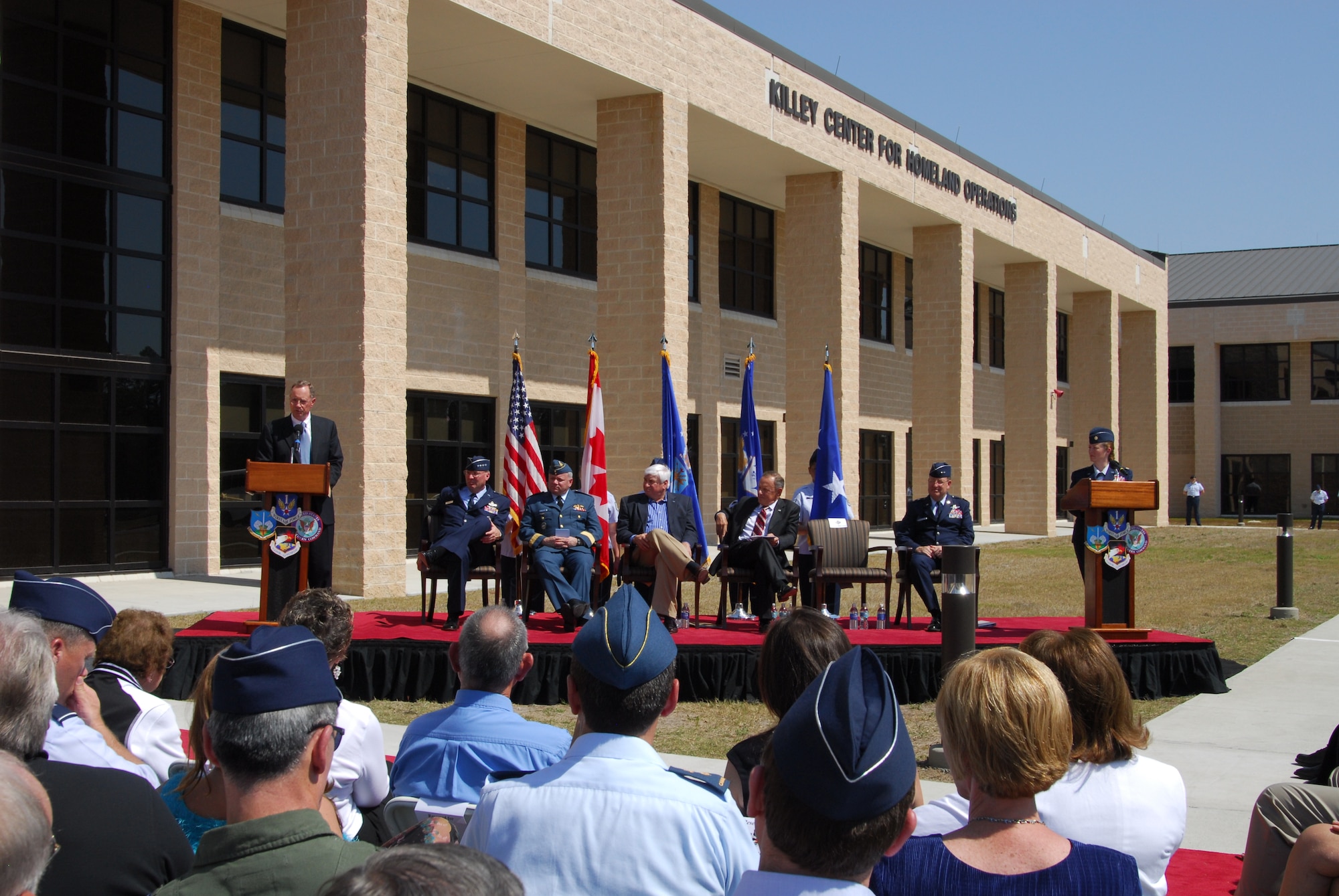 Maj. Gen. Larry K. Arnold speaks to the crowd as (from left to right) Gen.
Craig McKinley, Lt. Gen Charlie Bouchard, Congressman Allen Boyd, Maj Gen.
Larry Arnold, Maj. Gen. Hank Morrow, and Maj. Susan A. Romano look on.
General Arnold was honored in a ceremony where the new 1st Air Force
headquarters complex access road was named for the former 1st AF commander.  (U.S. Air Force photo by Lisa Norman)
