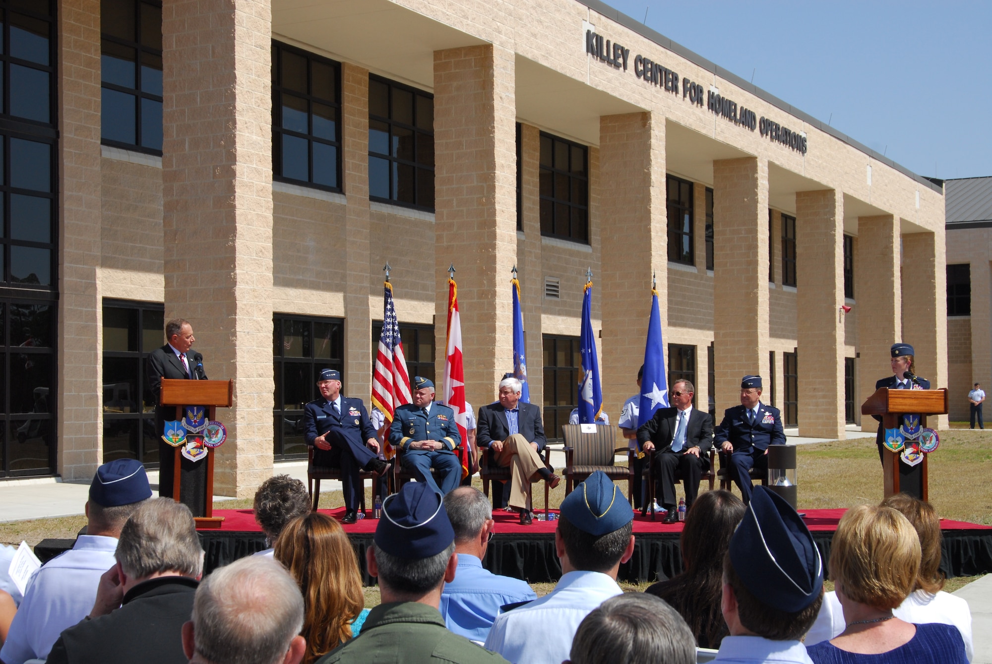 Maj. Gen. Philip Killey speaks to the crowd as (from left to right) Gen.
Craig McKinley, Lt. Gen Charlie Bouchard, Congressman Allen Boyd, Maj Gen.
Larry Arnold, Maj. Gen. Hank Morrow, and Maj. Susan A. Romano look on.
General Killey was honored in a ceremony where the new 1st Air Force
headquarters complex was named after the former 1st AF commander. (U.S. Air Force photo by Lisa Norman)
