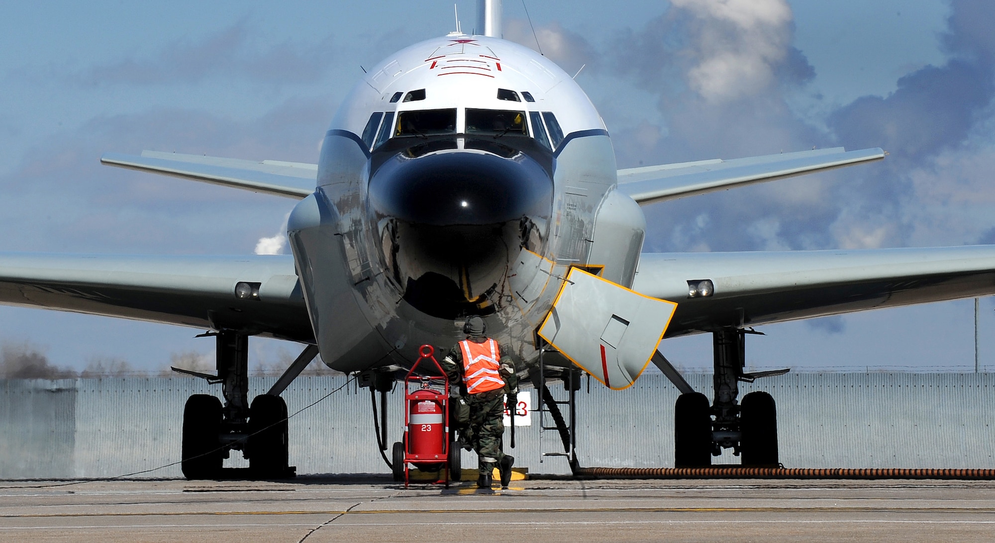 OFFUTT AIR FORCE BASE, Neb.-- Senior Airman Matt Schooveld, crew chief with the 38th Aircraft Maintenance Unit, prepares a RC-135V/W Rivet Joint reconnaissance aircraft, located on the lower parking ramp, Offutt AFB,  for takeoff as part of an Operational Readiness Exercise March 11. 55th Wing Airmen went through a thorough three day exercise to test their mission skills prior to deploying. The 55th wing is in preparation for an Operational Readiness Inspection Sept. 10-16. 

U.S. Air Force Photo by Josh Plueger
