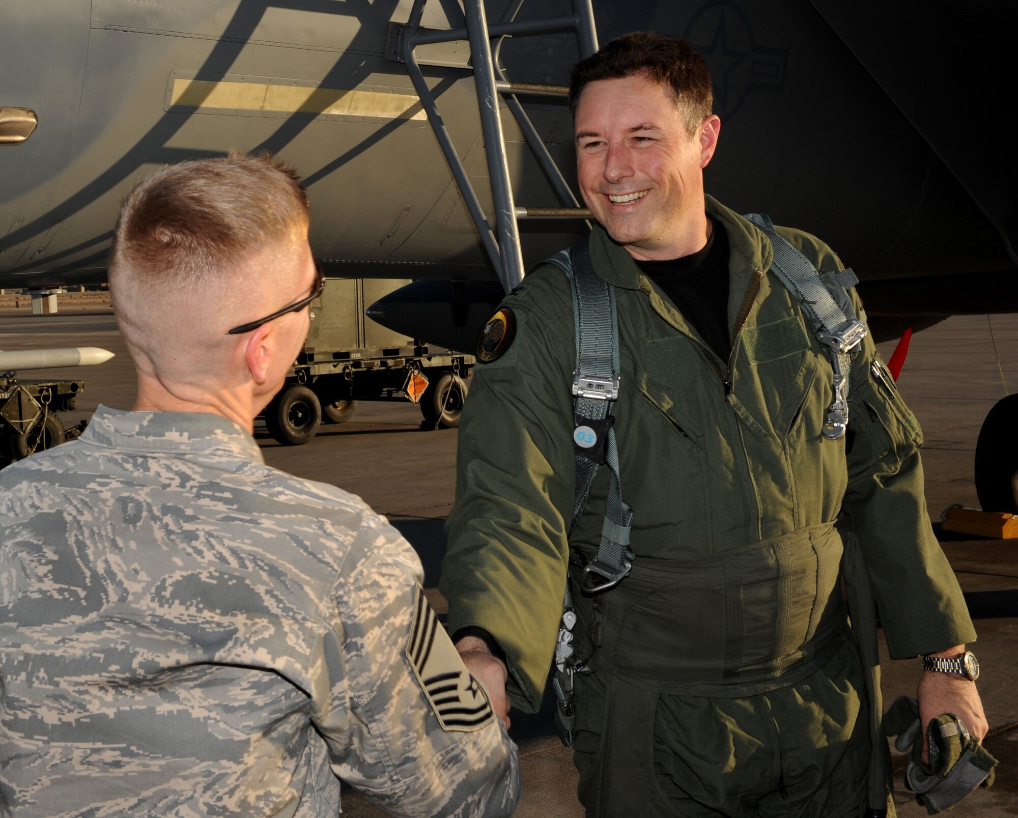 NELLIS AIR FORCE BASE, Nev. – From left, Chief Master Sgt. William Harner, 366th Operations Group superintendent, welcomes 366th Fighter Wing Commander Col. John D. Bird II to Nellis Air Force Base March 4. Colonel Bird came to Nellis to participate in the U.S. Air Force Weapons School. Comprised of 16 squadrons, the U.S. Air Force Weapons School teaches graduate-level instructor courses that provide the world's most advanced training in weapons and tactics employment to officers of the combat air forces. (U.S. Air Force photo/ Airman 1st Class Debbie Lockhart)