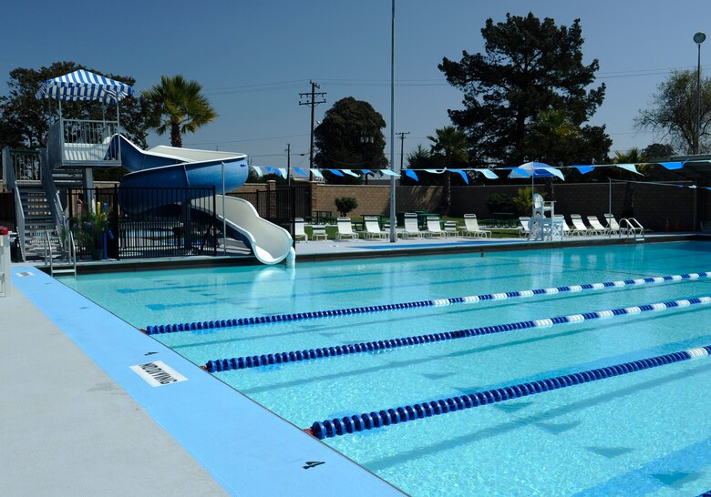 VANDENBERG AIR FORCE BASE, Calif. -- The base pool officially re-opens after ribbon-cutting ceremony here March 12.  The more than 50 year-old pool was vandalized in August, 2008 and closed for cleaning.  The pool received nearly $750,000 in upgrades after it was discovered that various pipes were leaking and causing massive looses in money per year.  The upgrades are projected to save Vandenberg more than $100,000 per year.  (U.S. Air Force photo/Senior Airman Stephanie Longoria)