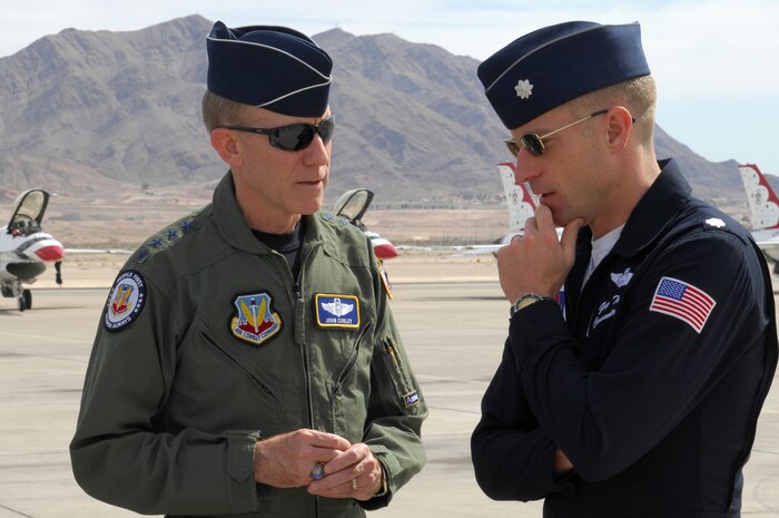 Gen. John D. W. Corley, Air Combat Command commander, speaks with Lt. Col. Greg Thomas, the U.S. Air Force Aerial Demonstration Team "Thunderbirds" commander  prior to the Thunder Bird Acceptance Show, March 12. The acceptance show kicks-off the Thunderbird's travel season. The Thunderbirds are scheduled to perform in more than 70 shows in the United States, Puerto Rico and the Far East.  (U.S. Air Force photo by Staff Sgt. Taylor Worley)