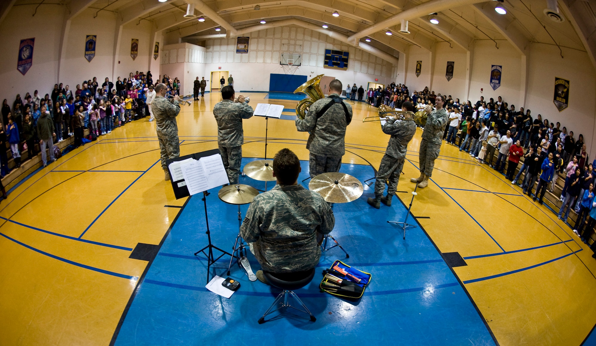 Members of the U.S. Air Force Band of the Pacific's Alaska Brass perform for students at Ignatius Beans Sr. School in Mountain Village, Alaska, on March 11, 2009. The concert of the five-piece brass and percussion ensemble is part of Operation Arctic Care, a Navy-led medical readiness exercise providing no-cost health care and veterinary support to 12 villages in Western Alaska.  (U.S. Air Force photo by Senior Airman Christopher Griffin)
