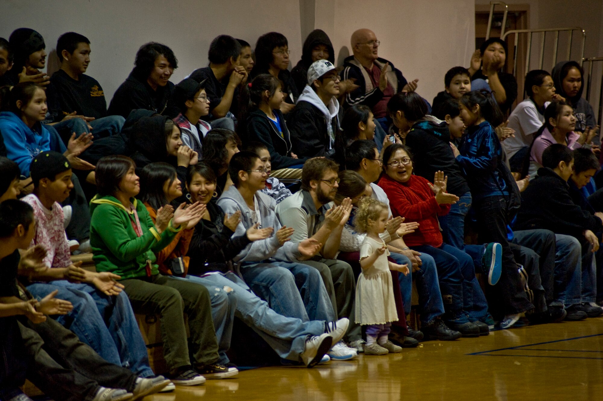 Students and faculty at Ignatius Beans Sr. School in Mountain Village, Alaska, applaud the U.S. Air Force Band of the Pacific's Alaska Brass on March 11, 2009. The concert of the five-piece brass and percussion ensemble was part of Operation Arctic Care, a Navy-led medical readiness exercise providing no-cost health care and veterinary support to 12 villages in Western Alaska.  (U.S. Air Force photo by Senior Airman Christopher Griffin)