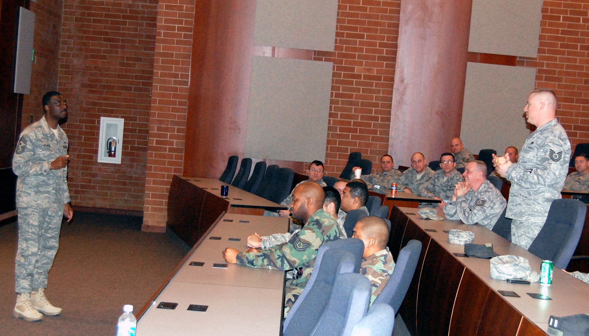 Chief Master Sgt. Fitzgerald Hentz, U.S. Air Force Expeditionary Center command chief master sergeant, answers a question posed by Tech. Sgt. Jason Marsh of the 421st Combat Training Squadron during an NCO call in the center's Grace Peterson Hall on Fort Dix, N.J., on March 12, 2009.  Chief Hentz took the opportunity to talk about leadership, NCO responsibilities and related topics.  (U.S. Air Force Photo/Tech. Sgt. Scott T. Sturkol)