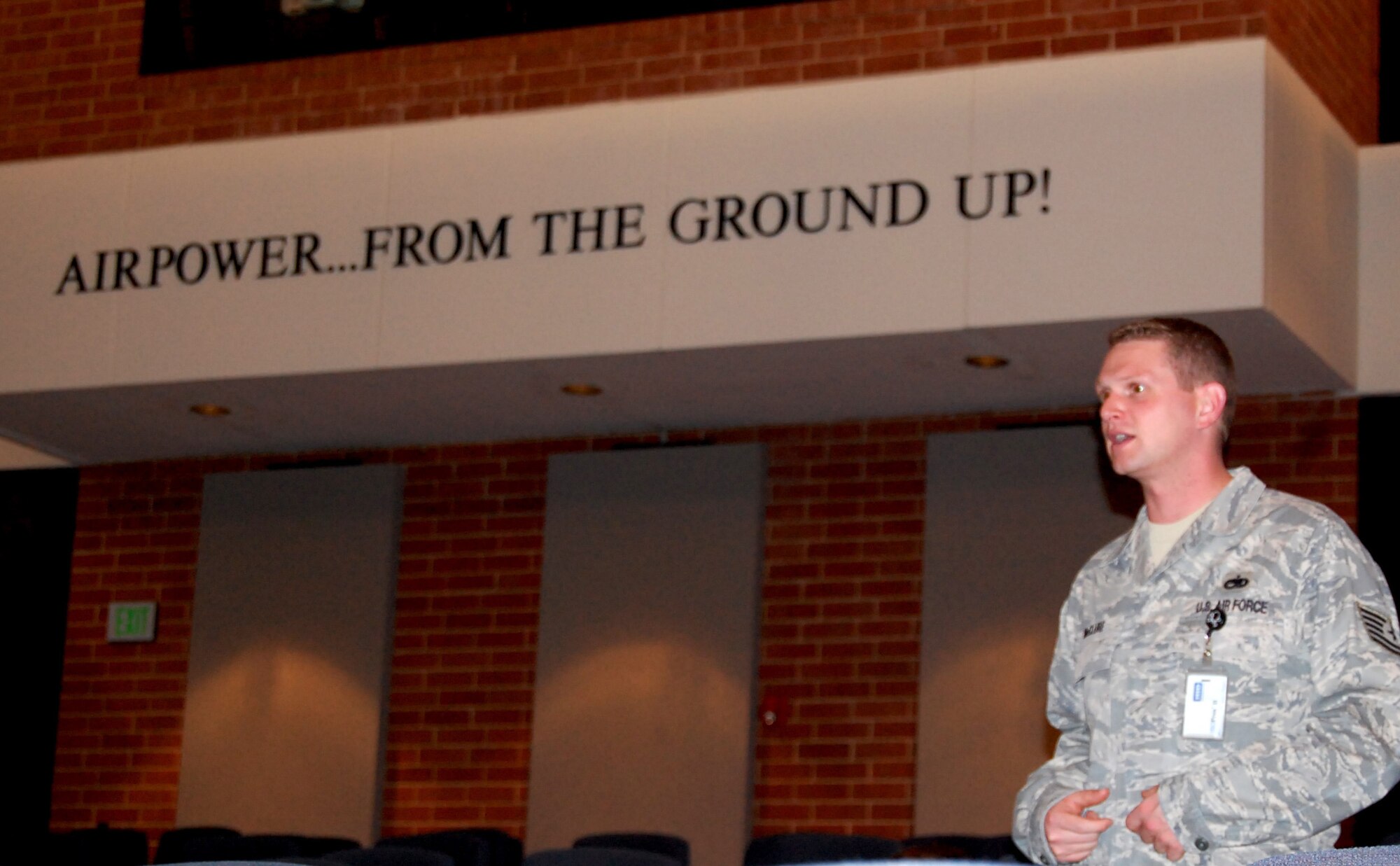 Tech. Sgt. Jonathan McClure from the Mobility Operations School asks a question to Chief Master Sgt. Fitzgerald Hentz, U.S. Air Force Expeditionary Center command chief master sergeant, during an NCO call in the center's Grace Peterson Hall on Fort Dix, N.J., on March 12, 2009.  Chief Hentz took the opportunity to talk about leadership, NCO responsibilities and related topics and to answer questions.  (U.S. Air Force Photo/Tech. Sgt. Scott T. Sturkol)