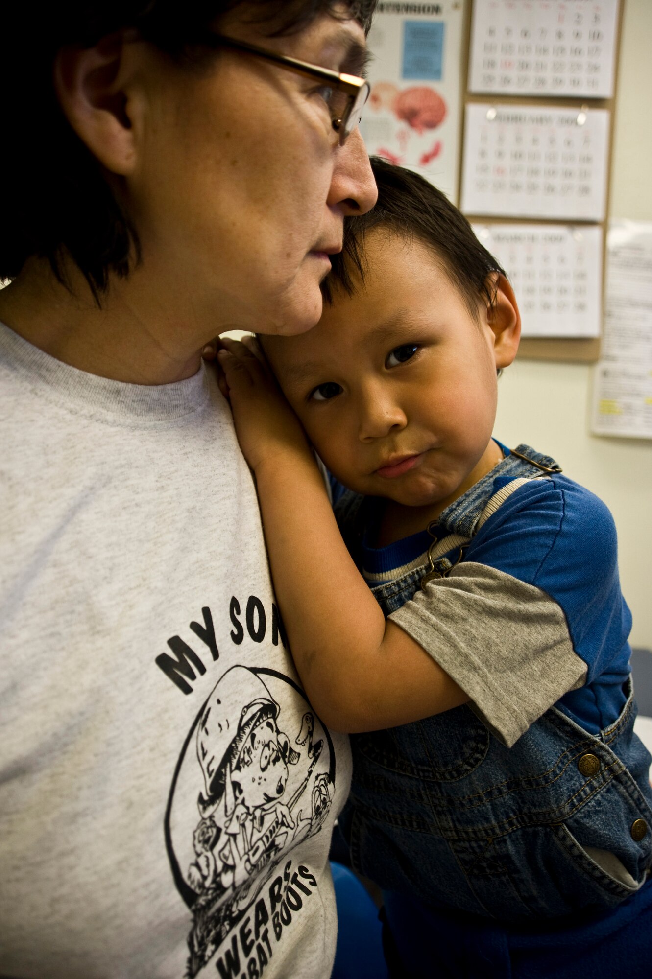 Hanson Alexie, 3, hugs his grandmother, Carole Alexie, during her health physical in Mountain Village, Alaska, on March 11, 2009. A joint military medical team is deployed to Mountain Village in support of Operation Arctic Care. This year's Navy-led mission has teams in 14 villages in Alaska's Yukon-Kuskokwim Delta region providing medical, dental and veterinary support at no cost to Alaskan natives. (U.S. Air Force photo by Senior Airman Christopher Griffin) 
