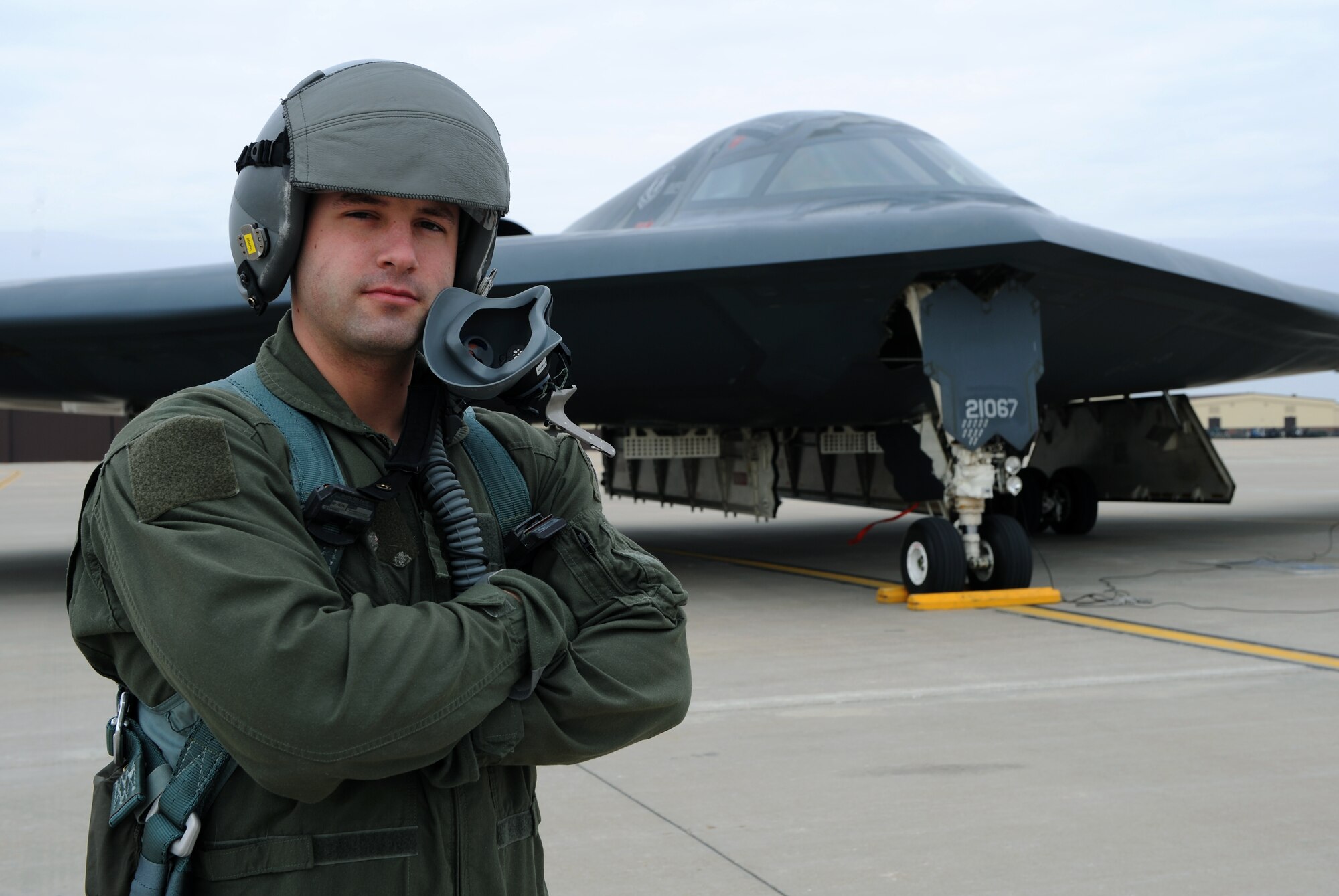 WHITEMAN AIR FORCE BASE, Mo. - Staff Sgt. Zachery Teague, 509th Aircraft Maintenance Squadron, stands in front of a B-2 Stealth Bomber March 13 after he has received the first enlisted incentive flight in a B-2. Sergeant Teague received this flight for being named the 2008 509th Maintenance Group Crew Chief of the Year. (U.S. Air Force Photo / Airman 1st Class Carlin Leslie)