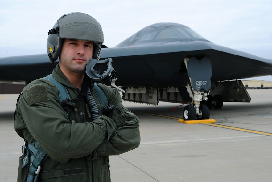 WHITEMAN AIR FORCE BASE, Mo. - Staff Sgt. Zachery Teague, 509th Aircraft Maintenance Squadron, stands in front of a B-2 Stealth Bomber March 13 after he has received the first enlisted incentive flight in a B-2. Sergeant Teague was the 509th Maintenance Group Crew Chief of the Year for 2008. (U.S. Air Force Photo / Airman 1st Class Carlin Leslie) 
