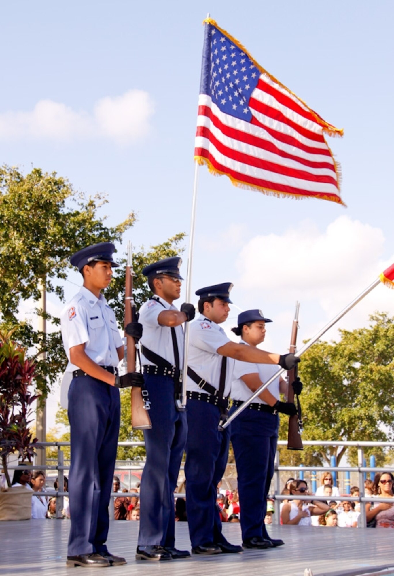 The Homestead High School Air Force JROTC Honor Guard presents the colors during a ceremony recognizing the 50th Anniversary of Air Base Elementary on Feb. 27. The elementary school was founded in 1958 on the former Homestead Air Force Base for children of military families. After Hurricane Andrew in 1992, a federal magnet grant was approved in the summer of 1995 to keep the school from closing, and an International Education Magnet Program was created at the school. (Courtesy photo by Eric Auffhammer)