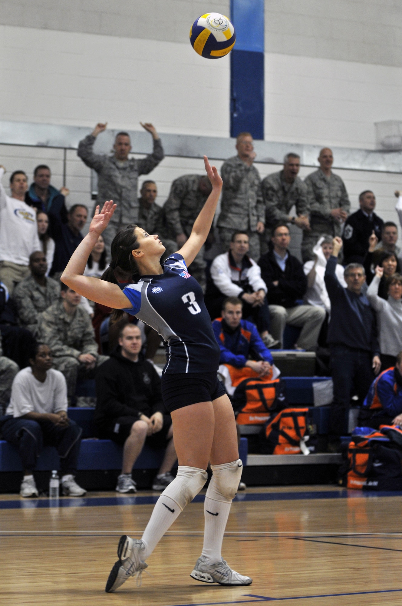 Beth Hoeltte of the USAFE Women’s Volleyball Team prepares to hit the winning serve of the Championship finals March 11, 2009 at RAF Lakenheath, England. The Women’s finals went to five matches with USAFE winning 15 to 13 (U.S. Air Force photo by Airman 1st Class Perry Aston)