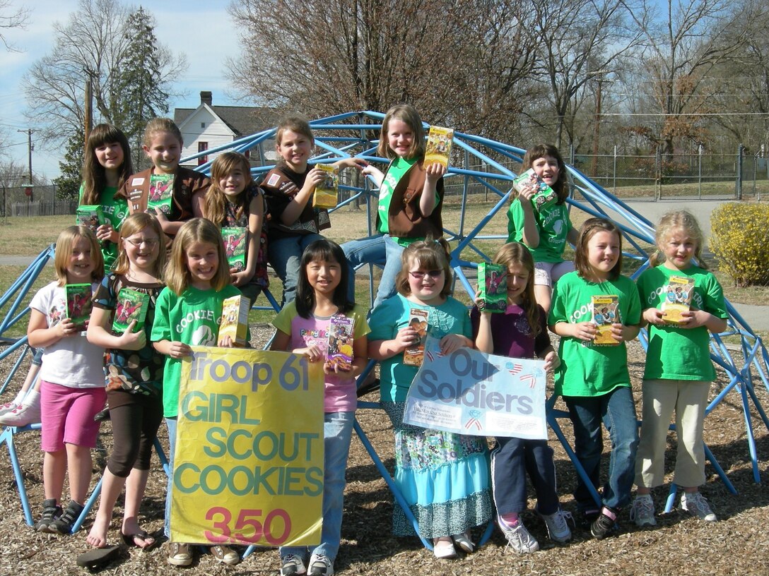 Brownie Troop 61, from Duluth, Ga., display the Girl Scout cookies they