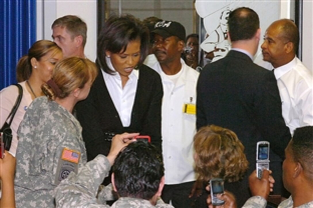 First lady Michelle Obama speaks with soldiers and civilians at Iron Mike Dining Facility on Fort Bragg, N.C., March 12, 2009. The first lady also visited the post's Praeger Child Development Center before traveling to Fayetteville to meet city leaders.