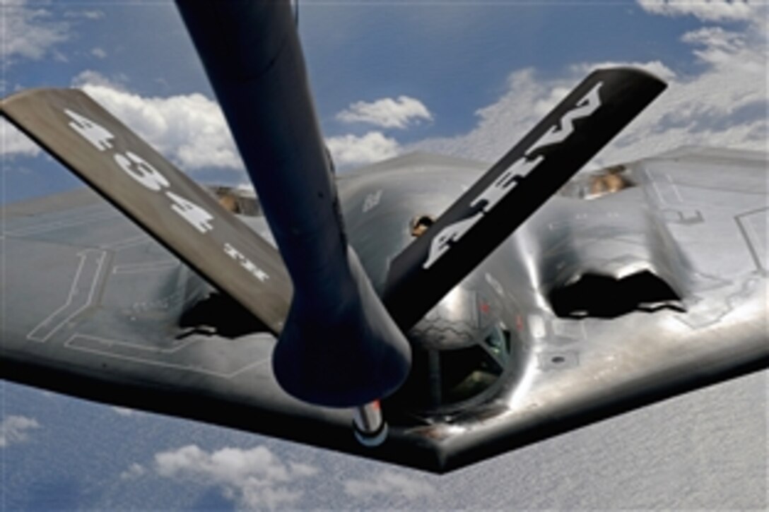 A U.S. Air Force B-2 Spirit aircraft positions to be refueled by a KC-135 Stratotanker aircraft over the Pacific Ocean, March 10, 2009. Four B-2 Spirits from the 509th Bomb Wing, 13th Bomb Squadron, are deployed to Andersen Air Force Base, Guam, as part of a continuing operation to maintain a bomber presence in the region.