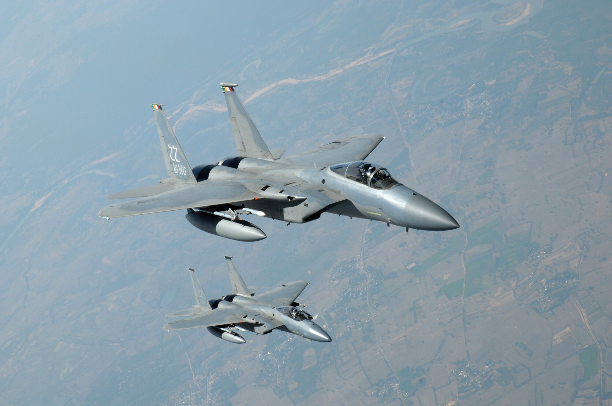 Two U.S. Air Force F-16 from Kadena Air Base, Japan, fly side-by-side after being refueled by an Air National Guard KC-135 Tanker from Hickam Air Force Base, HI, as part of the refueling phase of the Cope Tiger 2009 exercise at Korat Royal Thai Air Force Base, Thailand on March 12. 

Cope Tiger is an annual exercise held in Thailand to improve combat readiness and combined and joint interoperability of U.S., Thai and Singaporean forces while enhancing regional security and providing humanitarian support.
(U.S. Air Force Photo/Staff Sgt. Angelique Perez) 