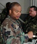 Airman 1st Class Eukenya Lewis, a reservist with the 38th Aerial Port Squadron, stood as an alternate for his team at the first 22nd Air Force Aerial Port ROUNDUP March 13-15 at Dobbins Air Reserve Base, Ga. Airman Lewis is also a squad corporal at The Citadel in South Carolina. (U.S. Air Force photo/Capt. Bryan Lewis)